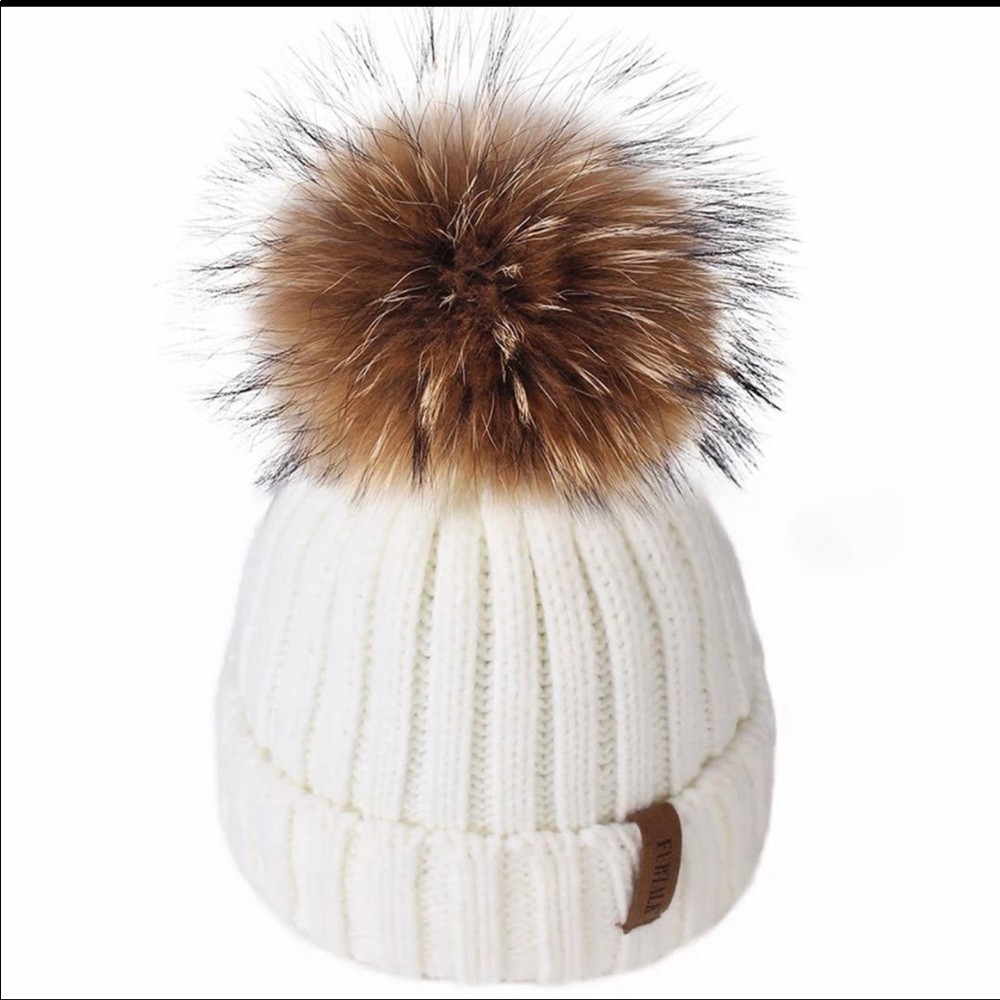 Beautiful kids hat. With real raccoon fur.